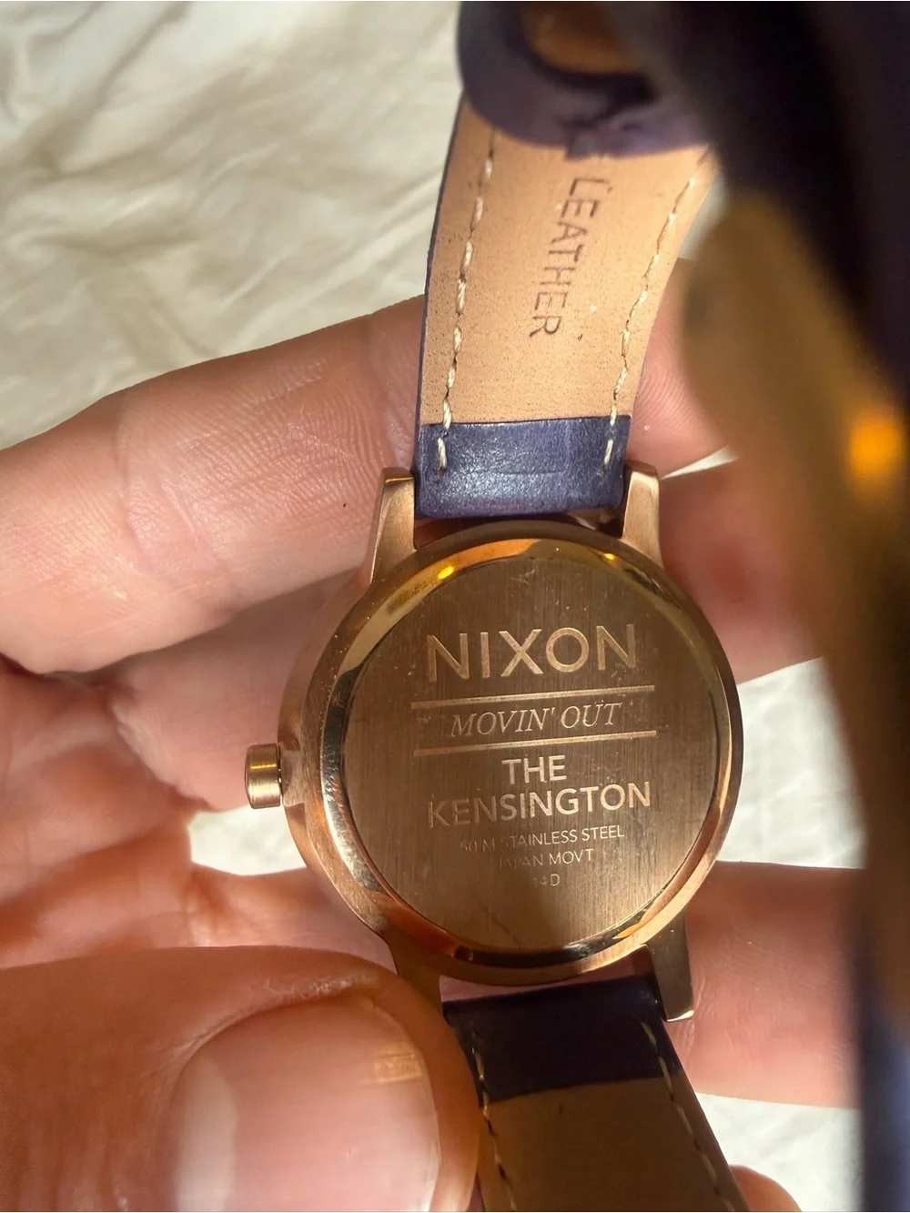 Nixon women’s purple Dial Leather Strap Watch